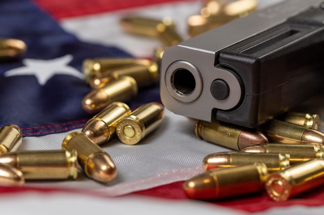 A stock photo of guns and bullets